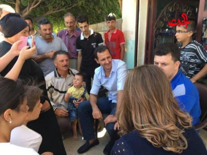 بالصور ...الرئيس الأسد يزور وعائلته عدداً من جرحى الجيش في قراهم بريف حمص