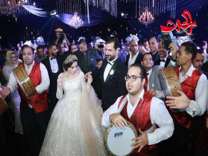 عروس الفنان محمود حافظ بفستان &quot;أميرات&quot; في حفل زفافها