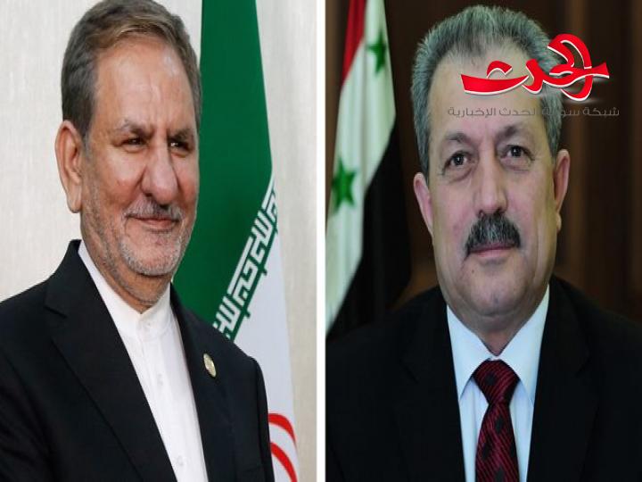 اتصال هاتفي بين عرنوس وجهانغيري حول تعزيز العلاقات السورية الايرانية