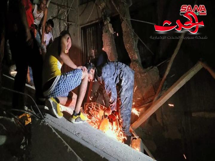 وفاة خمسة أشخاص بينهم ثلاثة من عمال بلدية اللاذقية جراء انهيار بناء قيد الإنشاء في الرمل الجنوبي