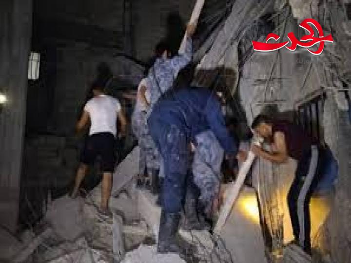 ما هي أسباب تواجد موظفي البلدية في المبنى المنهار في حي الرمل الجنوبي ليلا؟