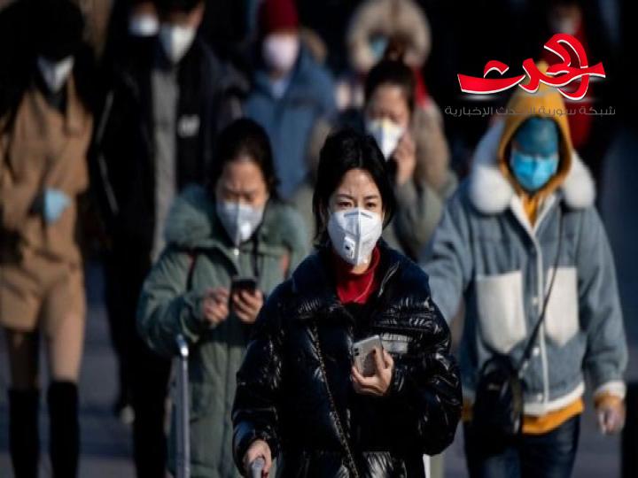 الصين تطالب مواطنيها بارتداء الأقنعة بعد التطعيم