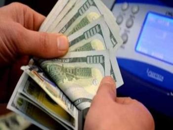 مقترح لضبط سعر الصرف عبر سوق نظامي للقطع
