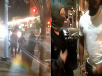 المقاتل الأمريكي جون جونز يقف في وجه العابثين بالممتلكات في احتجاجات فلوريدا