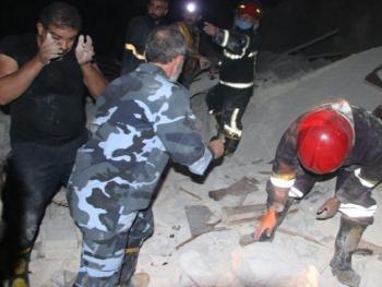 وفاة امرأة واصابة شخص في انهيار مبنى سكني بحلب