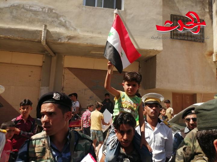 رفع العلم الوطني فوق قسم شرطة طفس