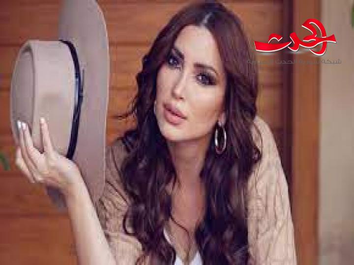 نسرين طافش  تخطف الأنظار بفستان زهري مثير 