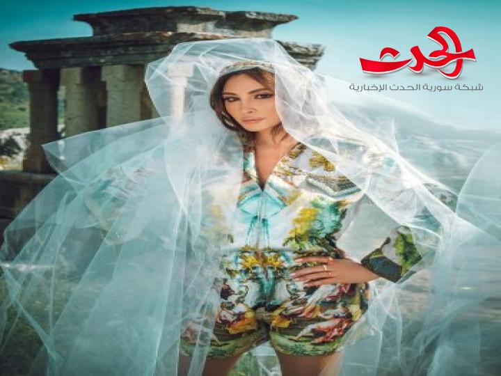 بالصور- إليسا تخطف الأنظار بالطرحة البيضاء
