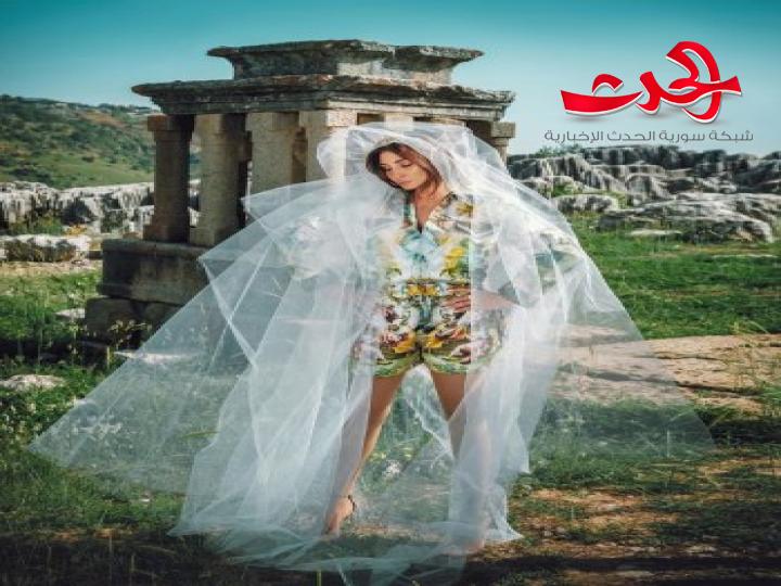 بالصور- إليسا تخطف الأنظار بالطرحة البيضاء